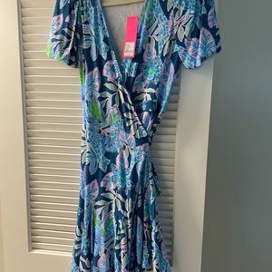 Beautiful floral Lily dress , length is to the knee